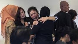 Des corps et débris du vol QZ8501 d'AirAsia retrouvés en mer