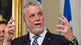 Le Premier ministre Philippe Couillard abandonne 1800 syndiqués québécois